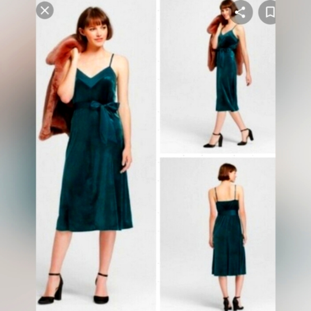 Green velvet slip dress with satin sash